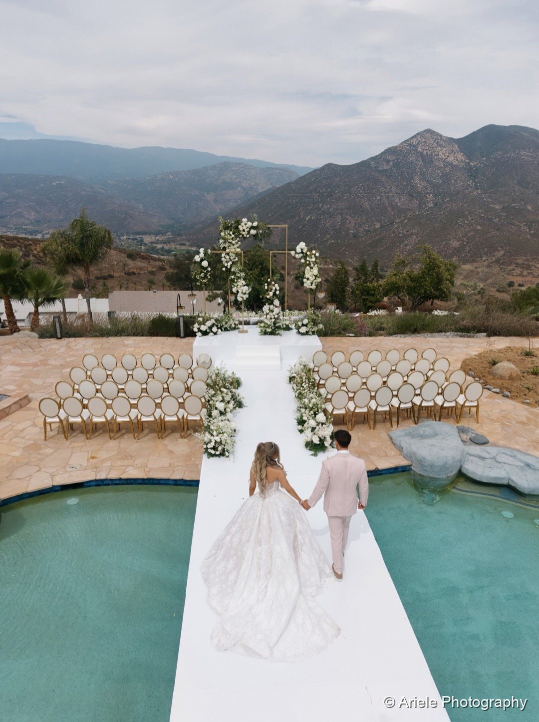 Aerial view of Ashley and Brodie’s poolside ceremony and reception at their 40-acre San Diego estate