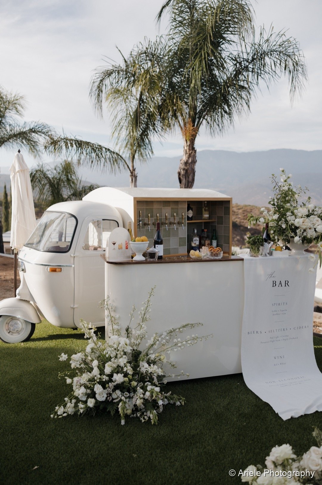 Vintage bar cart set up for the relaxed welcome gathering at the San Diego estate